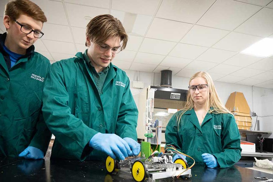 Students working on the Chemical Engineering Car